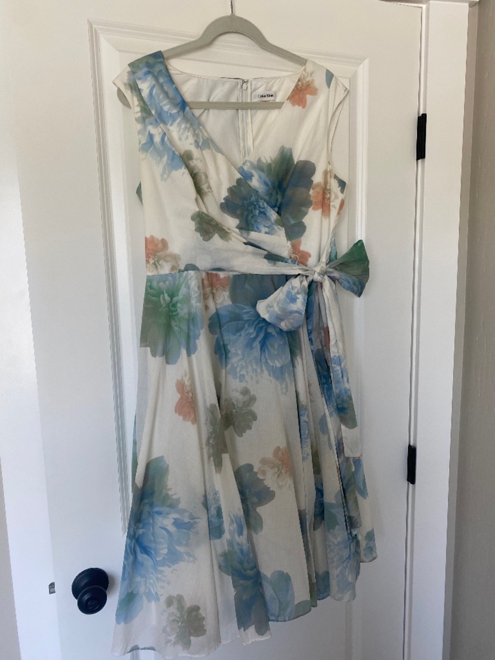 Calvin Klein size 12. Pretty blue flowers with a scattering of peach